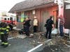 Crews located the fire after opening up a section of the wall and roof eves. 