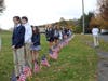 The names of the veterans from the Immaculate family were read and students processed with flags bearing those veterans names to the s