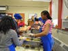 Culinary students from Henry Abbott Technical School​ in Danbury assist at the 2013 Thanksgiving Feast, held at The Alternative Center for Excellence in Danbury.