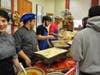 Culinary students from Henry Abbott Technical School​ in Danbury assist at the 2013 Thanksgiving Feast, held at The Alternative Center for Excellence in Danbury.