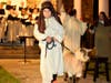 A young shepherd leads his goat to the stable in a scene from a previous "Living Nativity." The Christmas story again will unfold on the front steps of Jesse Lee Memorial United Methodist Church in Ridgefield.