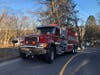 The fire broke out along  a hillside on Hickok Avenue in Bethel.