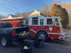 The fire broke out along  a hillside on Hickok Avenue in Bethel.
