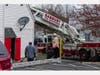Danbury Fire Department first responders reported heavy smoke and flames showing from the rear of a two-story multi-family building on Bells Place Monday morning.