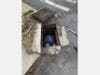 The Danbury firefighters were able to removing the top of the drain and dive in to retrieve the ducklings from the covert pipe.