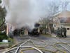 Danbury Fire Department crews battled a large amount of fire from the garage of a 2 ½ story wood frame condo end unit, requiring a third alarm response