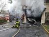 Danbury Fire Department crews battled a large amount of fire from the garage of a 2 ½ story wood frame condo end unit, requiring a third alarm response