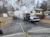 First responders found a car burning in proximity to a residence in the Candlewood Trailer Park in Danbury.