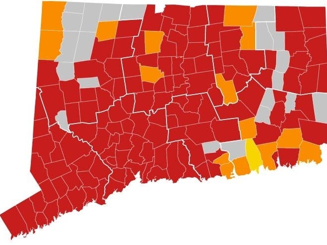 Towns fall into the red zone when average daily cases exceed 15 per 100,000 population over a two-week average. There are now 132 of 169 towns still in the red zone in Connecticut.