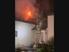 First responders found a fire visible fire on the rear side of the house