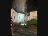 First responders found a fire visible fire on the rear side of the house