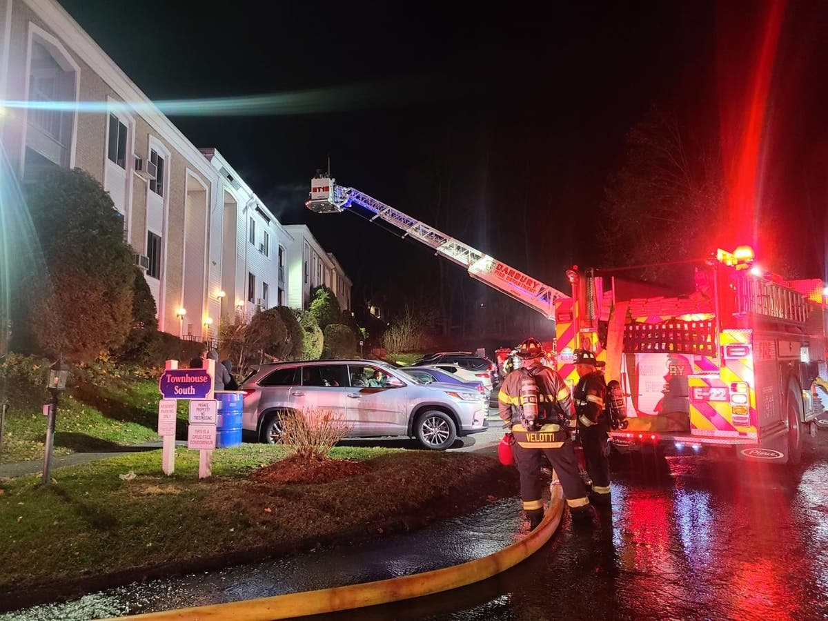 Members of the Danbury Fire Department "made quick work" of the top floor fire at a South Street townhouse complex.
