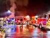 Bethel fire officials said first responders found a car in the middle of the lot with a fire still contained to the engine compartment. 