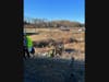 Crews established a system of ropes to safely access the wreckage, free the driver from the cab of the truck, and haul him back up the hill to the roadway. 