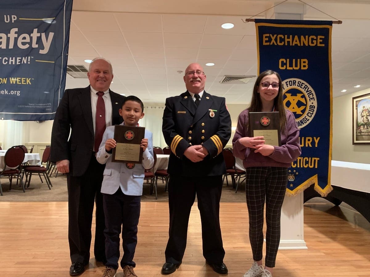 left to right: Exchange Club member and former Danbury Fire Marshal James Russell, Juan Reyes, current Fire Marshal Terry Timan and Megan Anderson.
