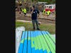 Members of the Monroe Police Department were among the many volunteers who pitched in their time and sweat this past weekend to bring the project through the final stretch.