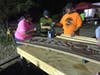 Members of the Monroe Police Department were among the many volunteers who pitched in their time and sweat this past weekend to bring the project through the final stretch.