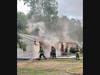 First responders found all occupants safely evacuated and a fire in the attached garage with smoke throughout the entire house.