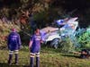 First responders found the cab of a truck had tumbled down off the Interstate, and came to rest in the area of heavy brush.