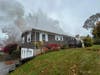 First responders to the Brookfield blaze found a one-story L-shaped ranch with smoke issuing from the eaves and roof area. 