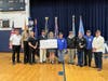 Immaculate presented veterans with a check for $2,000 from the Hill of Honor proceeds to be used for Connecticut Department of Veterans Affairs programs.
