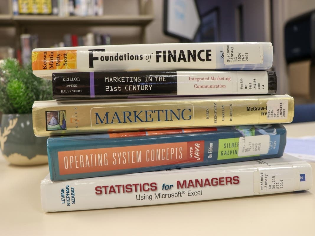 The average business textbook is now $180, and professors often require more than one textbook per class.