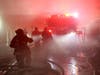 First responders found a working fire inside the warehouse at 36 Kenosia Avenue in Danbury, and quickly upgraded the response to a fourth alarm