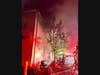 First responders found a working fire inside the warehouse at 36 Kenosia Avenue in Danbury, and quickly upgraded the response to a fourth alarm