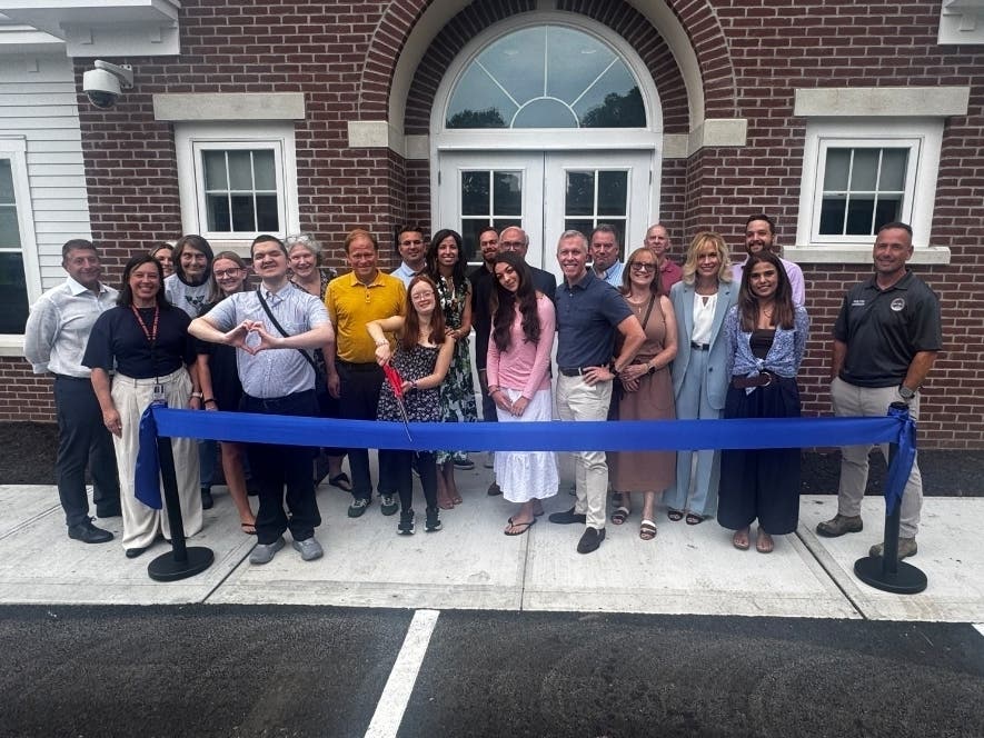 Staff, current and former Board of Education members, municipal leaders and local families attended the ribbon-cutting ceremony for the new home of the Alternative High School.