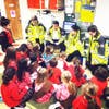 Twp of Washington Volunteer EMTs leads a lecture on basic first aid for the Brownie Scouts.