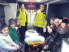 EMTs Nina Buchakjian and Lindsey Sirois lead a tour of the rear of the ambulance.
