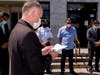 Father Racos gives Blessing to S.C. Police officers and Staff