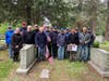 Exchange Club members placing flags at Lakeview Cemetery