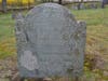 Grave of Ebenezer Johnson who died in 1736. This is one of the Oldest Stones in the Burial Ground.