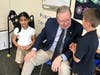 Mayor Martin listening to questions from Grade 1 students.