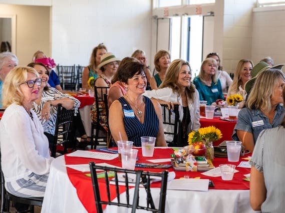 Dana Point Women’s Club members listen attentively to featured speaker, Rebecca Bailey, Palisades Elementary School Principal.  