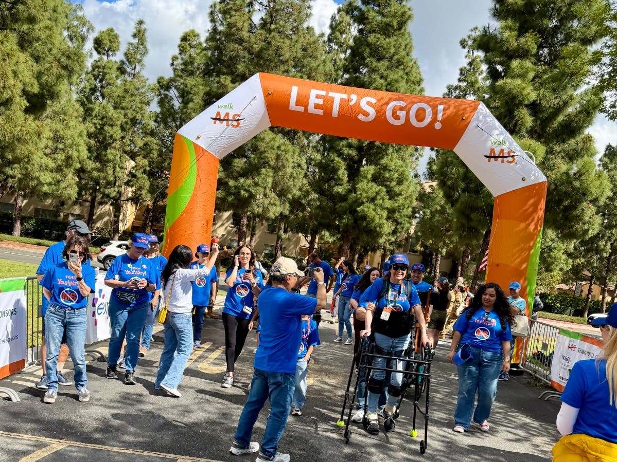 Anette Hogan, walking with the help of the EksoNR, an exoskeleton at last Saturday’s Annual Walk MS Orange County in Costa Mesa 