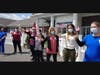 Manchester Manor staff wave flags, acknowledging the thanks of local first responders passing by in a celebratory "Thank You Parade" at the health care center on Tuesday, May 11. The event was part of National Skilled Nursing Care Week.