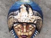 “Falcon Animal Totem” by Carlos Mateu (acrylic on horseshoe crab shell)