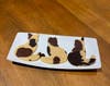 Maya Bhalla's handcrafted cat cookies reflected the animal theme that made her bake sales both memorable and fun for supporters.