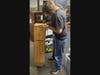 Sam Morgulas constructs one of the rocket bat boxes he designed for his local conservation project.