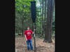 Sam Morgulas with one of the completed rocket bat boxes installed to provide roosting habitat for local bats.