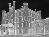 The abandoned administration building at Old Joliet Prison where shadow figures have been spotted in the windows at night.