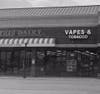 Vapes & Tobacco, located directly next to Oberweis Dairy in the Shoppes at Mill Creek Shopping Center