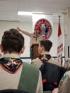 Scoutmaster Mike Marosy addresses the audience during the Scoutmaster Minute