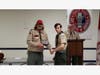 Zack Majorossy receives his Eagle pin from Scoutmaster Mike Marosy, Zach is the troop's 90th Eagle Scout.