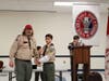 John Martoccia receives the Horsemanship merit badge from Scoutmaster, Mike Marosy