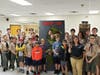 Members of Troop 200 pose with local Cub Scouts and Webelos after learning about the animals