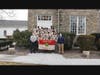 Scouts and Scouters from Troop 200 and members of the Lebanon Reformed Church in Lebanon Borough pose for a photo outside of the Church.