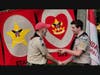 Troop 200 Life Scout, Justin Verlin receives merit badges from Scoutmaster Jeff Lutz.